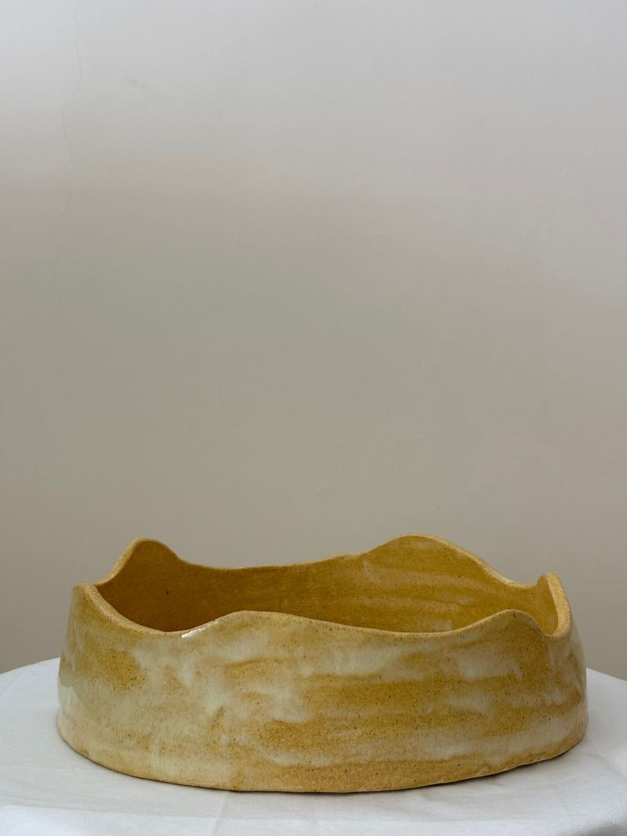 Golden clay bowl